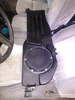 Speaker box with a speaker stock for a Dodge Ram