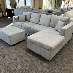 Grey Sectional And Ottoman