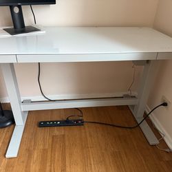 Adjustable table 55’ glass top computer table