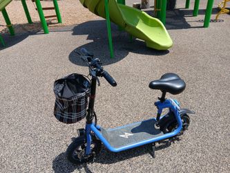 Blue electric sit down scooter