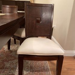 Cherry Veneers dining table with 5 side chairs .