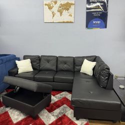 New In Boxes Black Faux Leather Sectional With Storage Ottoman 