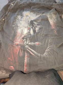 Nice sized short sleeve jacket. Very thin with a grim reaper style