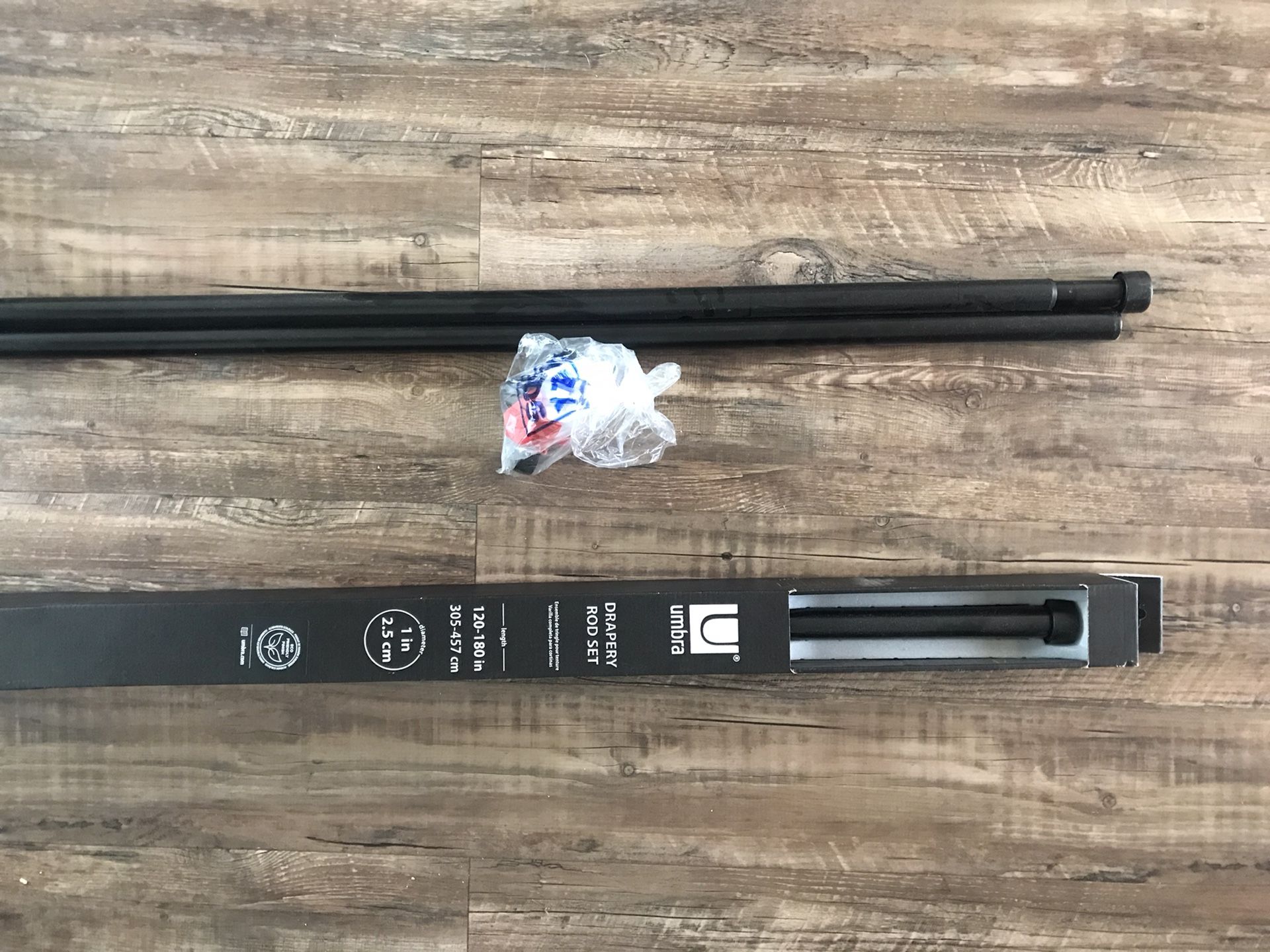 Black, 120-180 inch curtain rod by Umbra Cappa