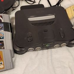 Nintendo 64 Bundle ( 3 Controllers , Games, and 1 Rumble Pack)