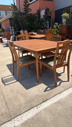 Mid Century walnut dining table with four chairs