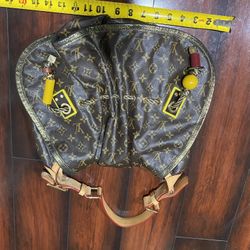 limited edition Louis Vuitton Monogram Kalahari GM hobo bag from the 2009 collection