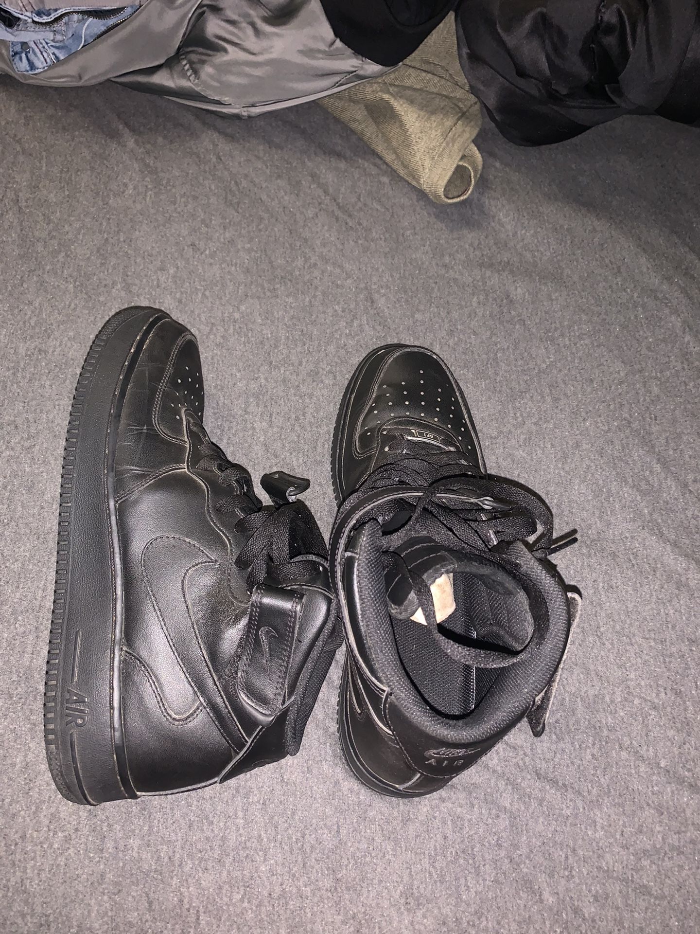 High top Black Air Force 1’s