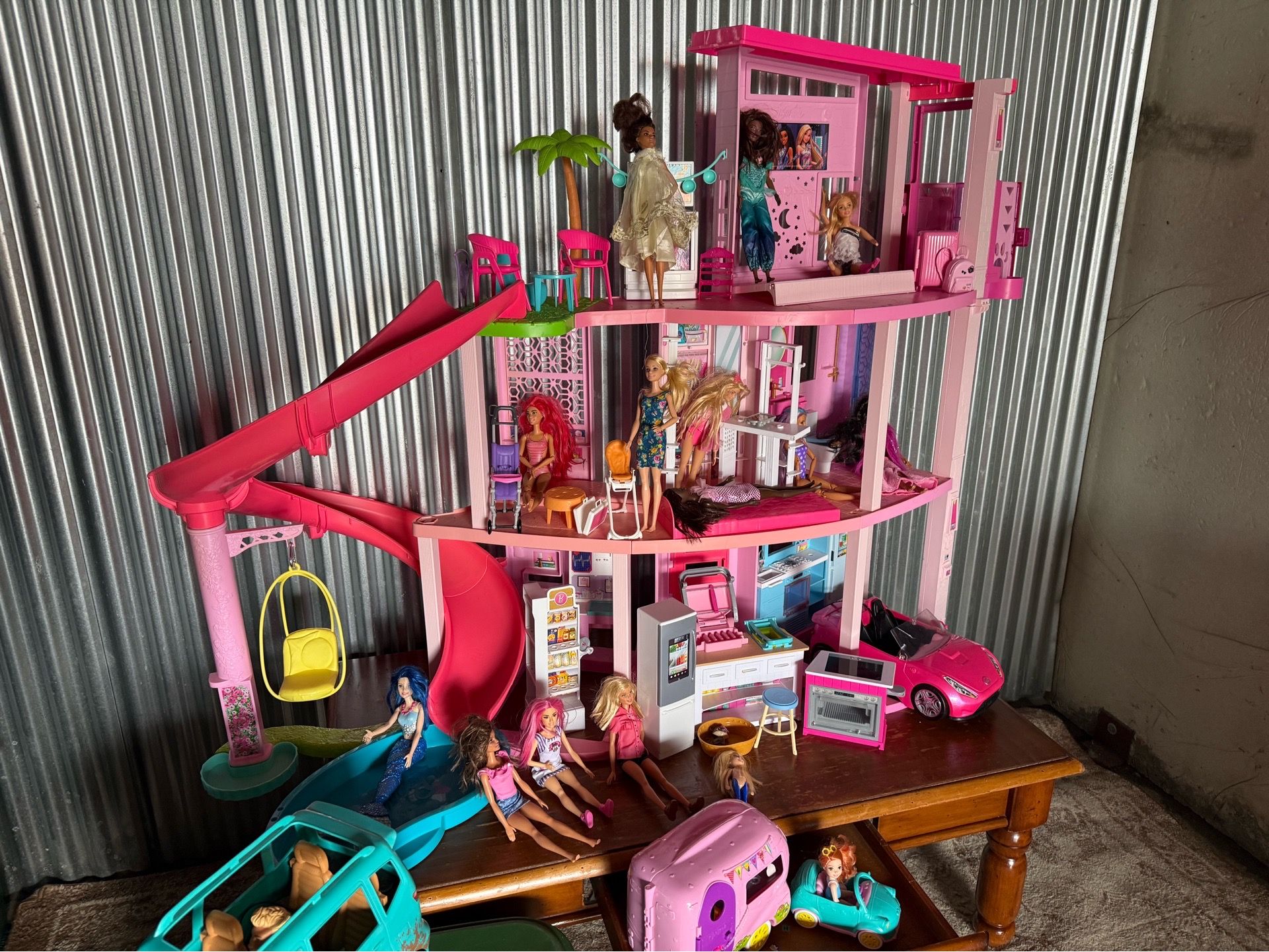 Huge Barbie dream house with dolls, cars and extra