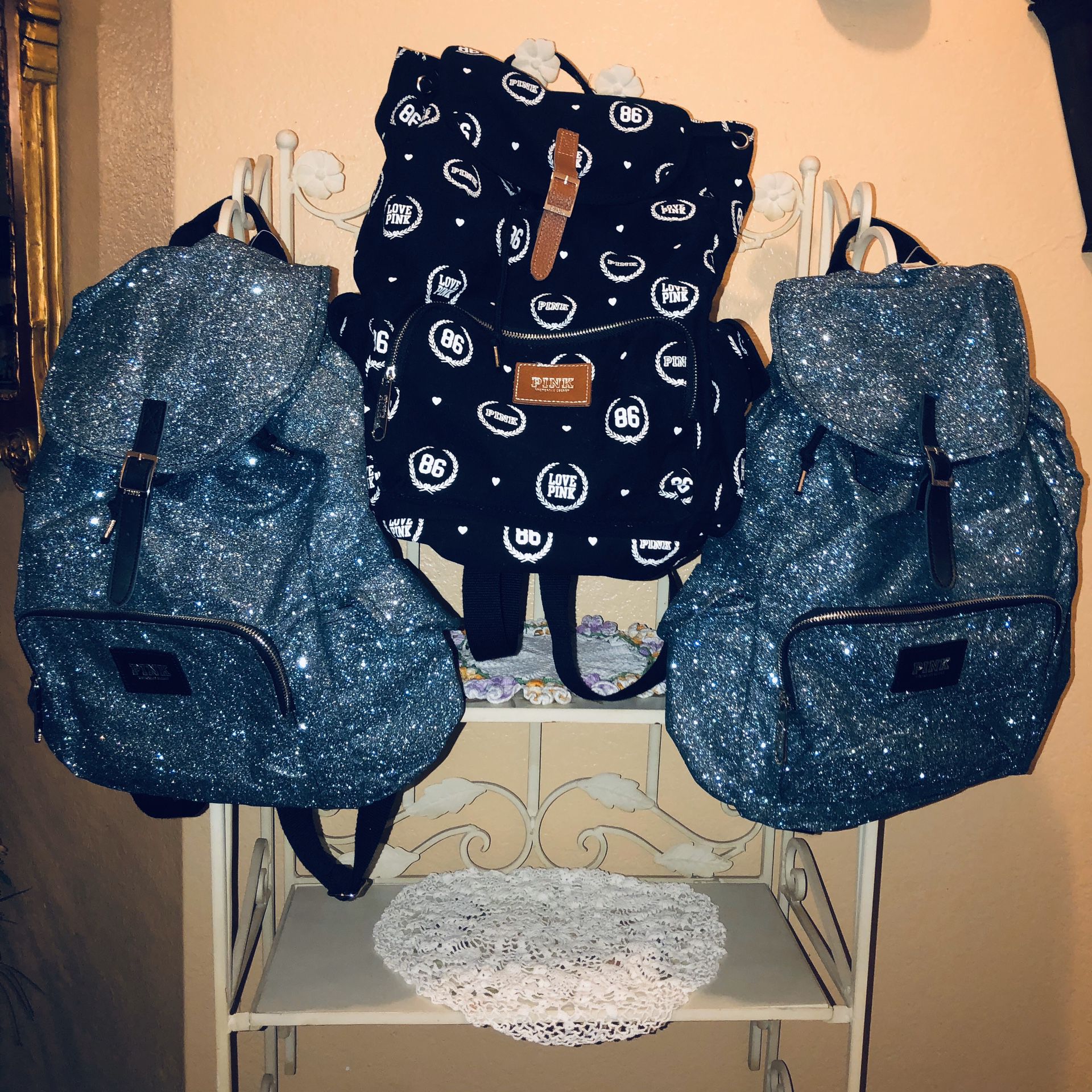 Victoria Secret PINK backpacks (2 NWT blue/metallic, sparkle) retail value 59.50 ( 1 blk/white NWOT)