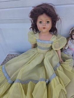 Antique Doll in Yellow Gown