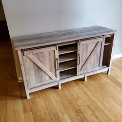 TV Stand. Fits Up To 65" Television. Less Than One Year Old. In Almost New Condition