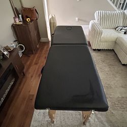 Black massage table