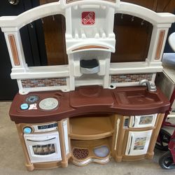 Kitchen With Some Play Toys 