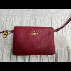 Authentic Red Coach wristlet with charms!