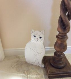 Wooden cat door stop