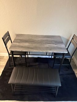 Brand new 4 piece table set