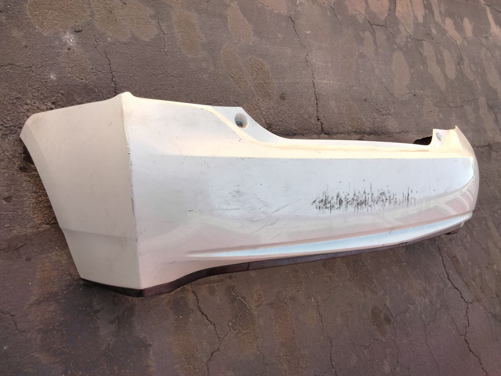 2010-2014 Toyota Prius hybrid Rear bumper with lip OEM.