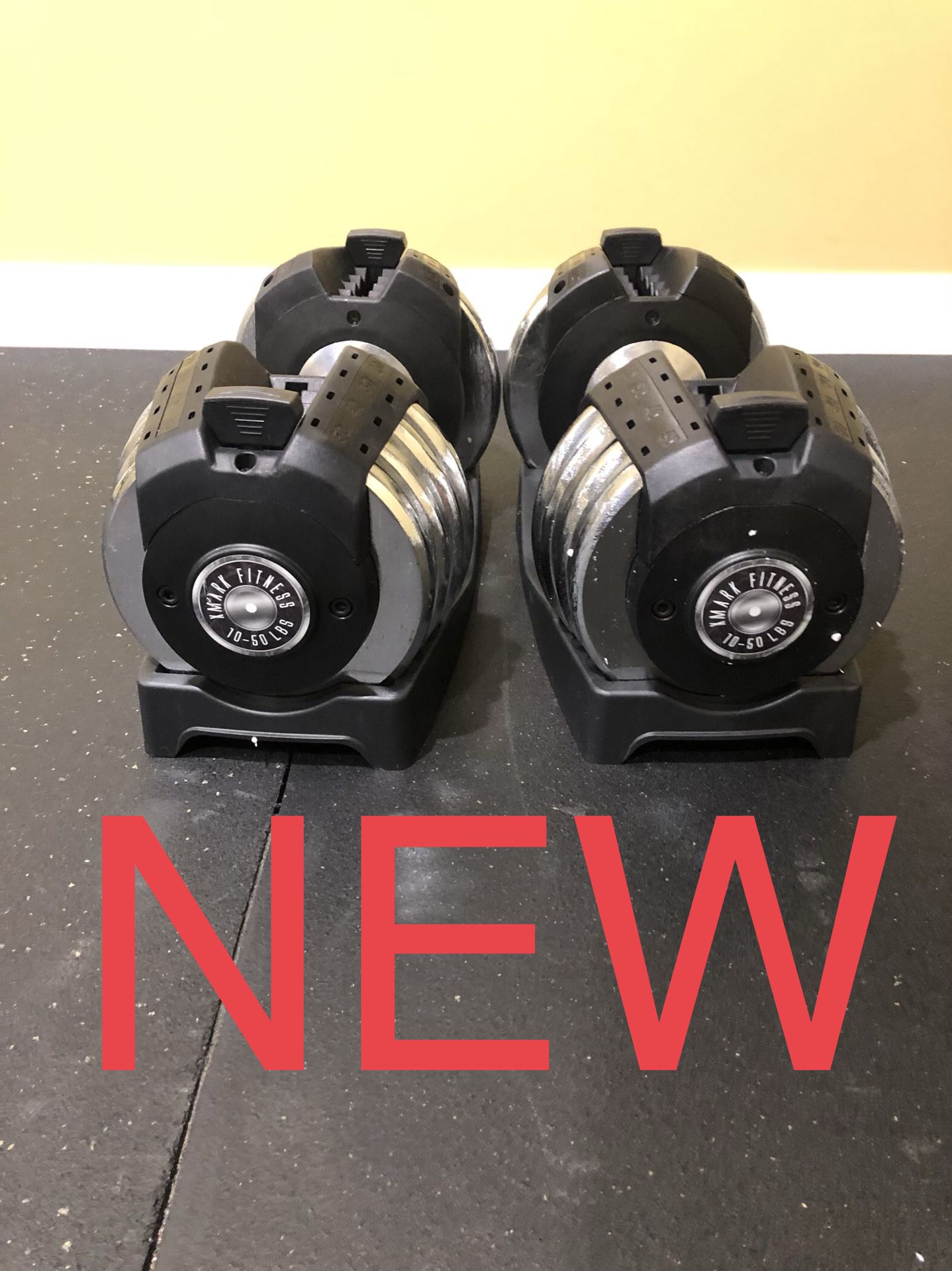 New/Never Used- Two Adjustable Dumbbell (10 - 50 lbs.) by XMark