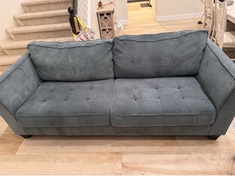 Gray couch gently used no stains need give ASAP