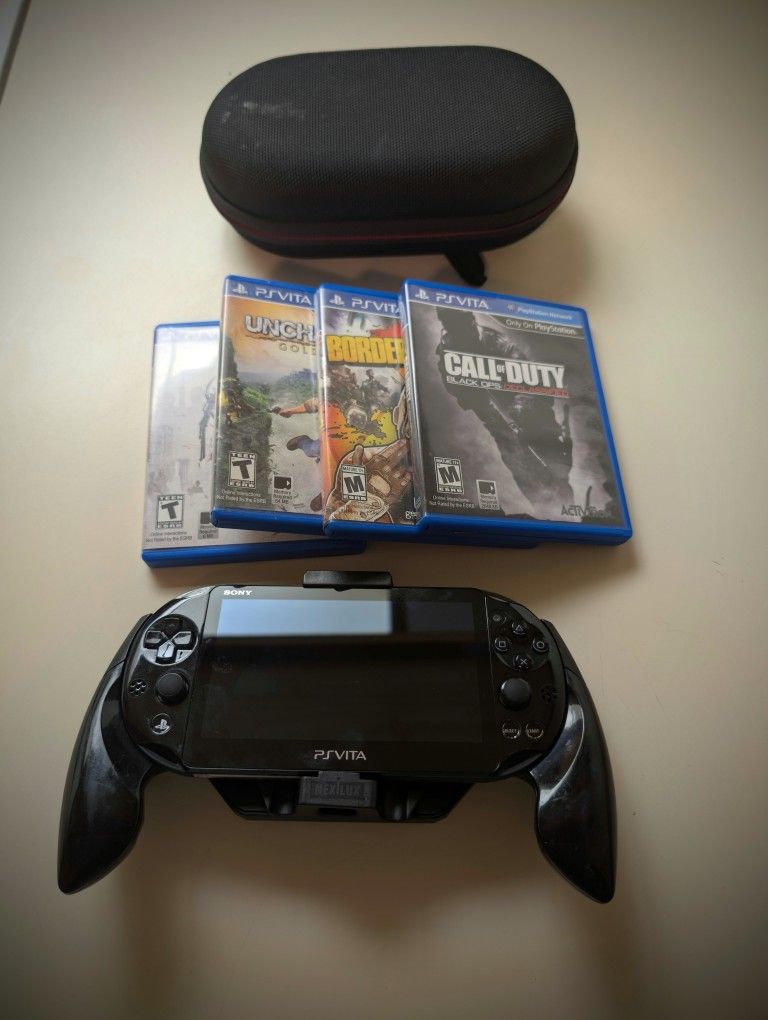 PS Vita Sim 2000 W/games