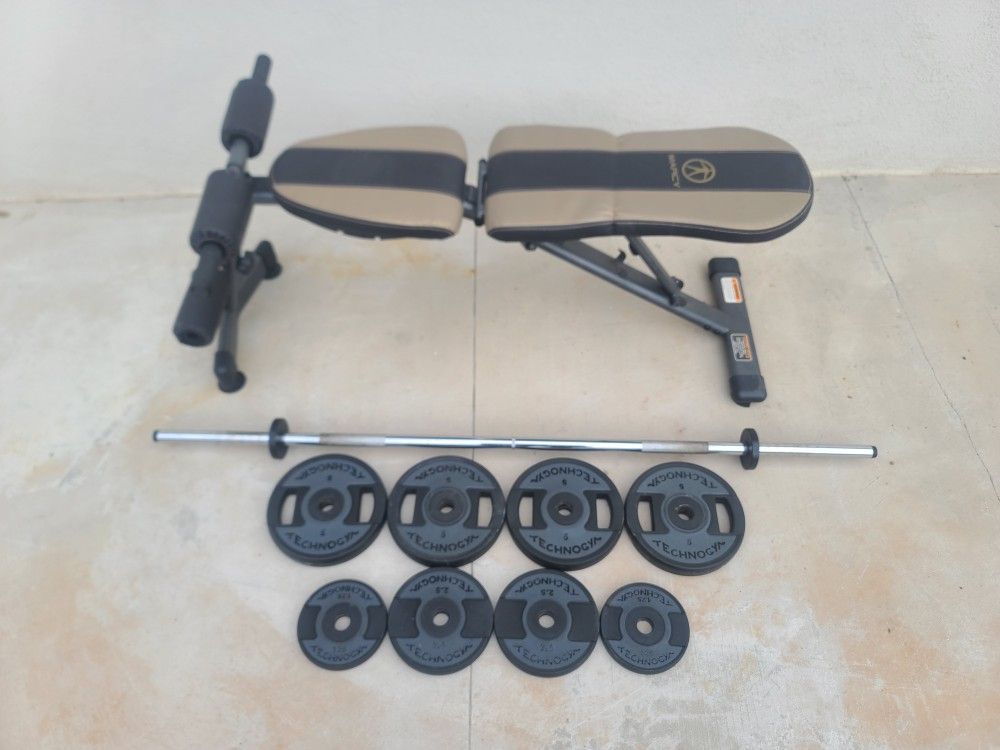 Marcy Bench & Technologym Urethane Plates And Bar! Selling Cheap. $125