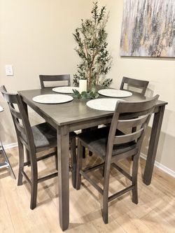 Ashley Counter Height Dining Table and 4 Counter Height Chairs