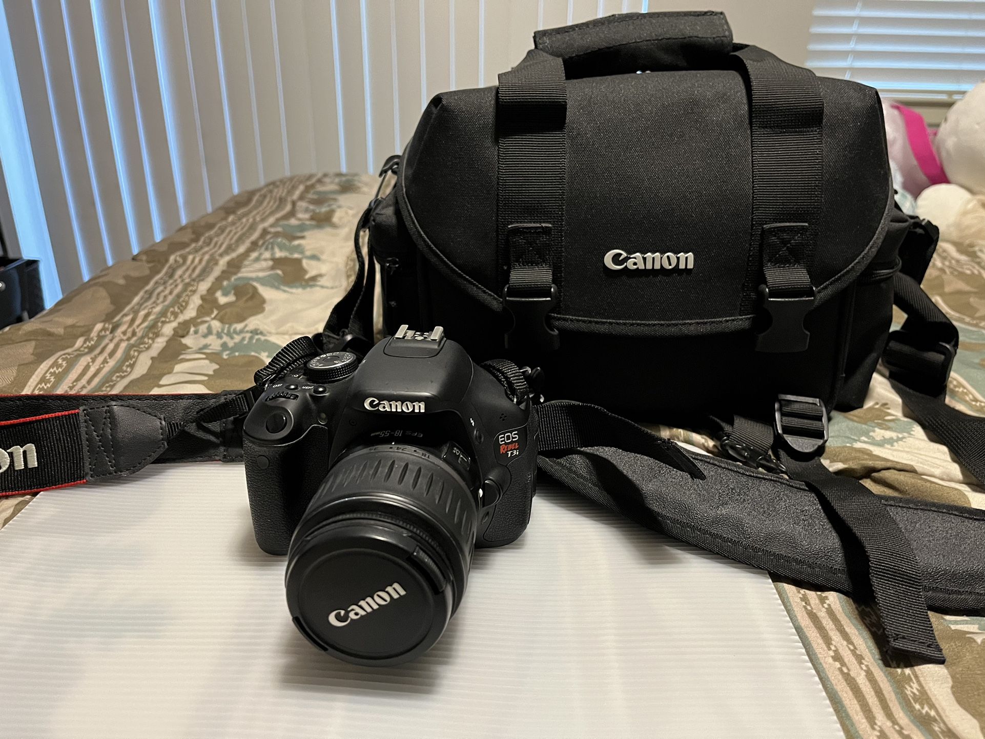 Canon rebel t3i dslr with bag and tripod