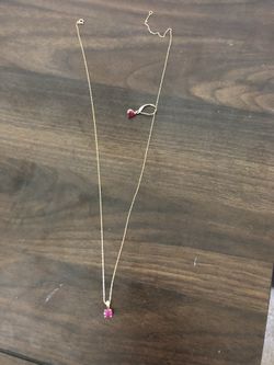 14 kt yellow gold and real ruby stone