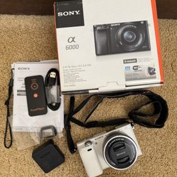 Sony Alpha a6000 Mirrorless Digital Camera 24.3MP SLR Camera with 3.0-Inch LCD (White) w/16-50mm Power Zoom Lens