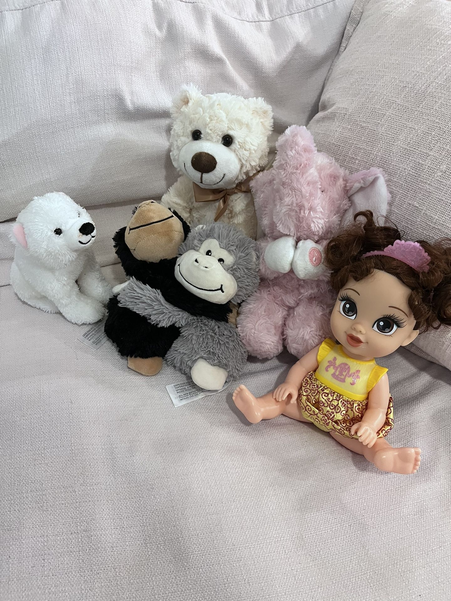 Stuffed Animals And Belle Doll