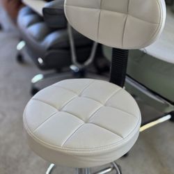 New white PU leather adjustable rolling salon or drafting stool with a backrest and footrest 