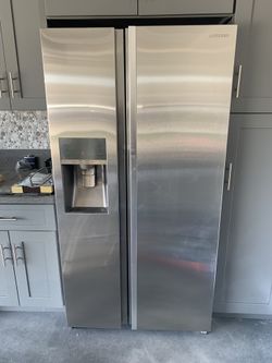 Fairly used/ Samsung side by side Fridge