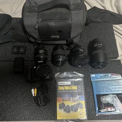 Nikon d5100 camera with 4 lens and other stuff 