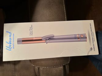 Unbound beauty in motion curls and waves anywhere wand by Conair