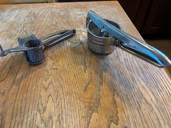 Antique vintage potato ricer and cheese grater