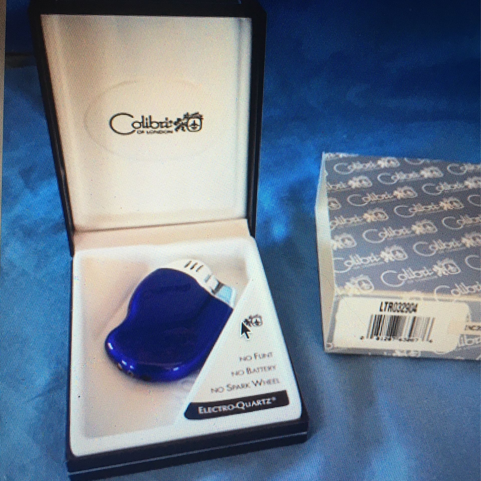 Vintage Colibri of London Electro Quartz Lighter Blue Glass