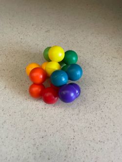 Cool rainbow fidget fits in hand
