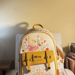 Winnie the Pooh among the Flowers Mini bag pack 