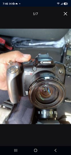 Canon powershot sx10is digital camera working uses aa batteries
