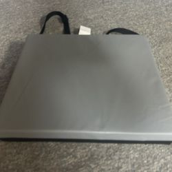 Cushion With Safety Strap Like New 