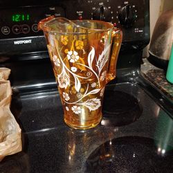 VINTAGE JEANETTE IRIDESCENT MARIGOLD CARNIVAL GLASS PITCHER WHITE FLORAL PATTERN