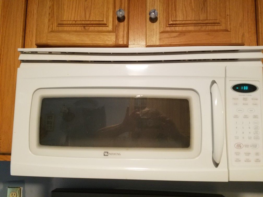 Microwave / vent over the stove