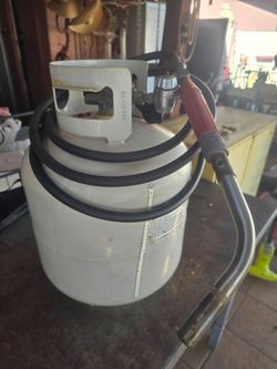 Propane tank with torch
