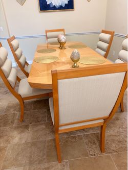 Elegant dinning table with 6 chairs