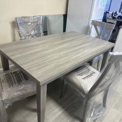 BRAND NEW TABLES AND CHAIRS 