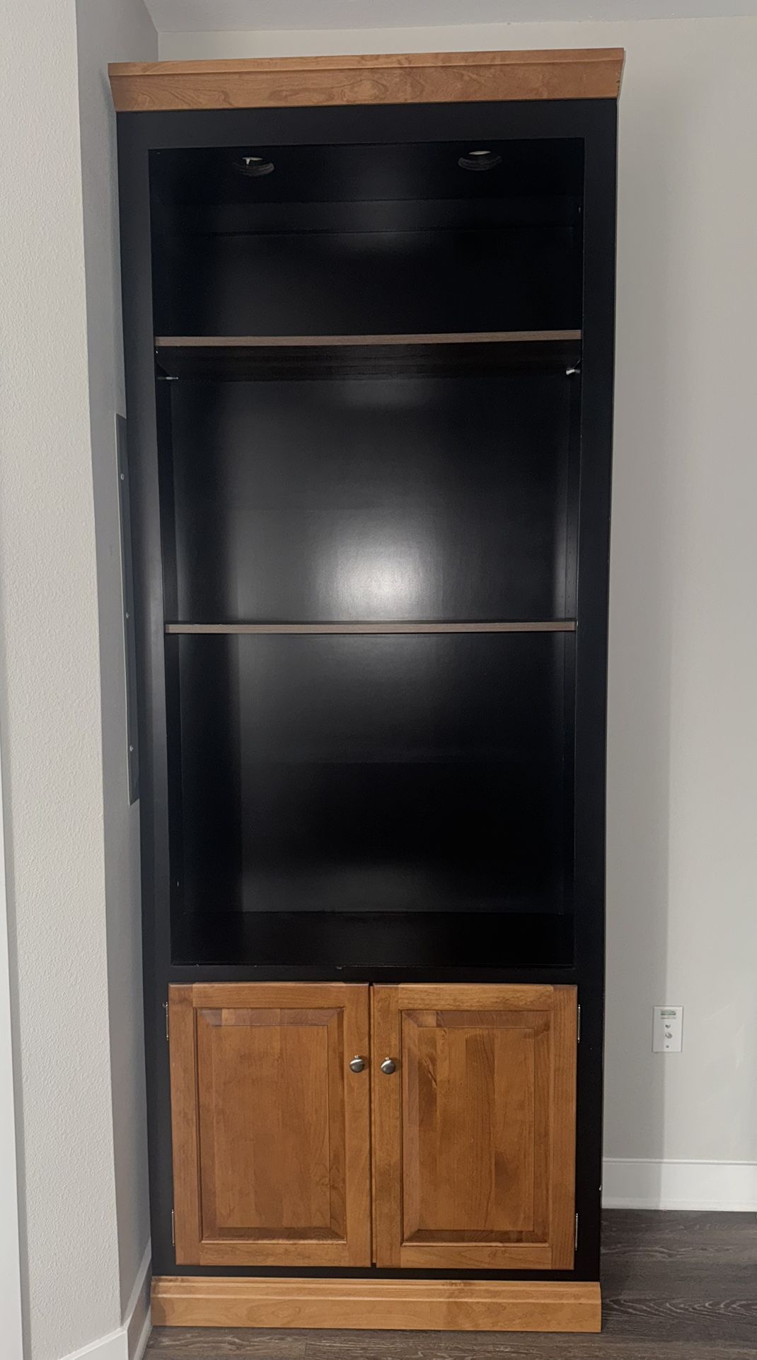 Display cabinet with storage