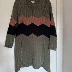 Cozy green knit sweater with a stylish pattern. Perfect for casual wear.