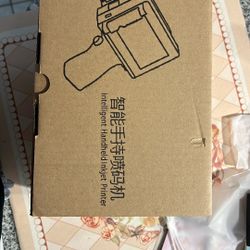 Intelligent Handheld Inkjet Printer
