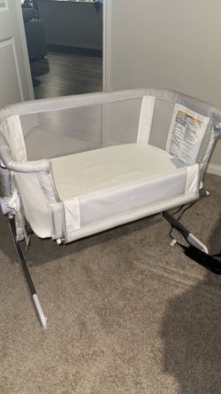 Baby delight beside me bassinet